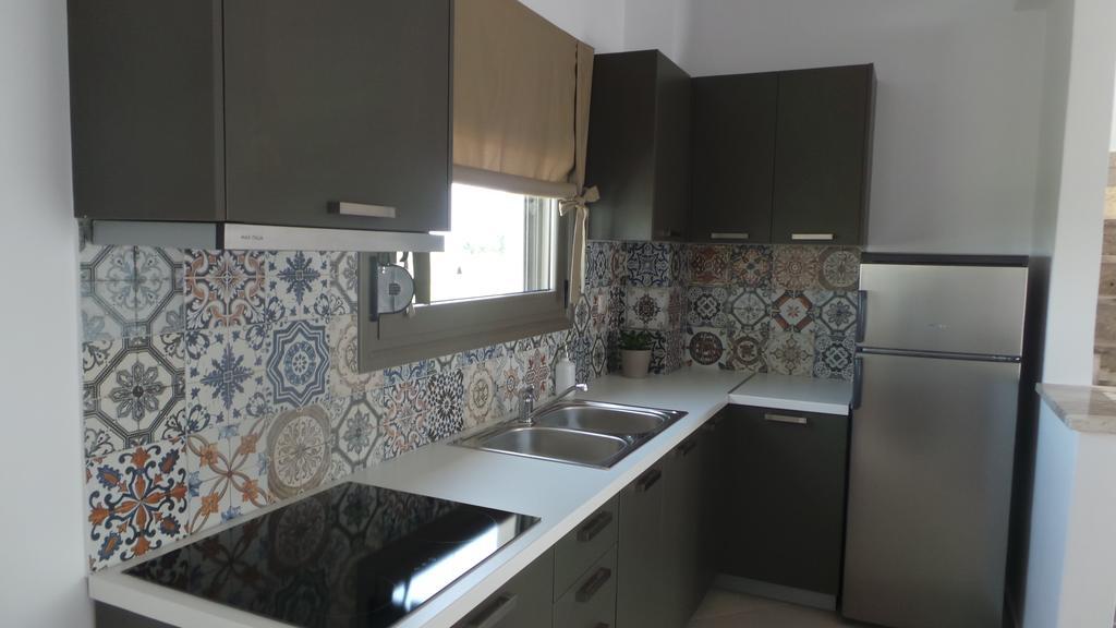 Niovi Boutique Apartments Áfitos Quarto foto